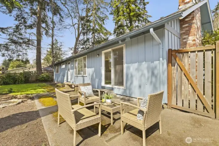 Patio for extended outdoor living space.