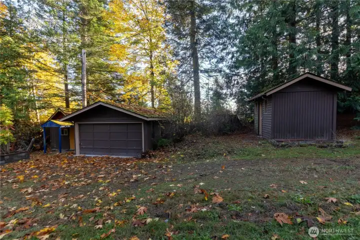 2 sheds plus a 2 car garage