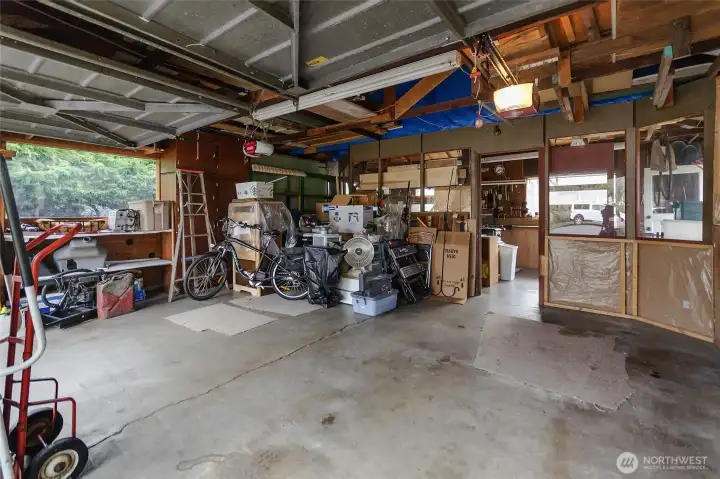 Entering through right side car door of garage.