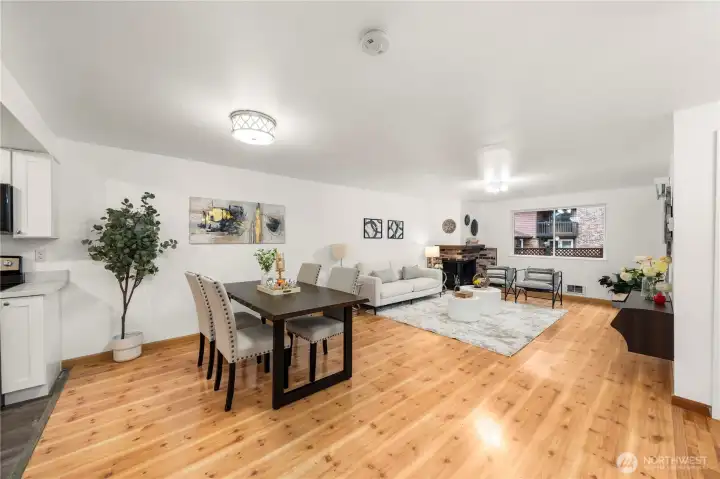 A generous dining area that flows seamlessly between the kitchen and living room