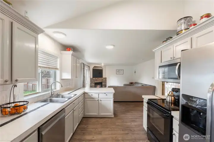 Head from the dining area to the Kitchen