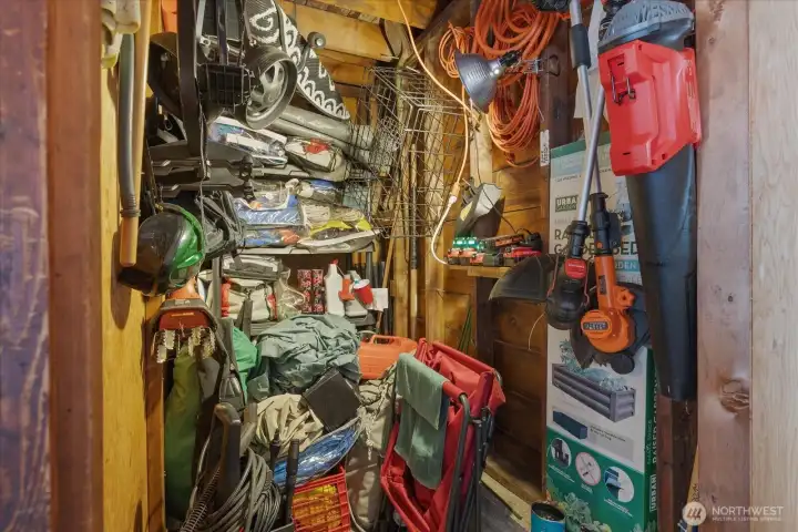 Additional storage area located inside the detached garage.