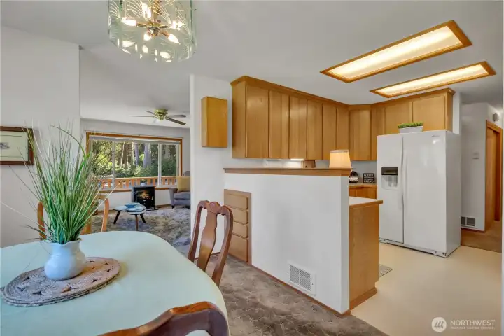 Dining Room is open to inviting kitchen