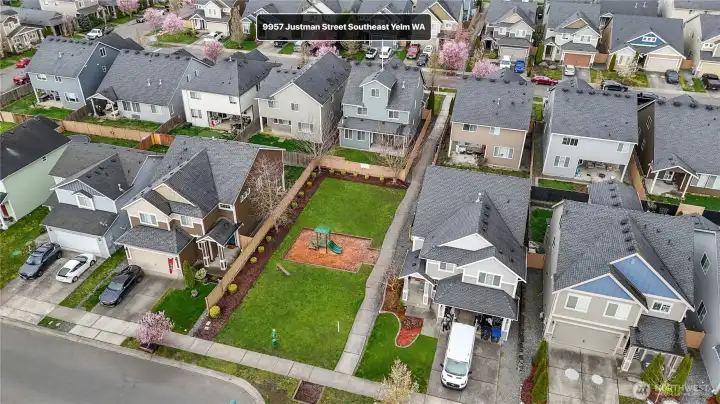 Backing onto a quiet park, enjoy the feeling of your own private green space