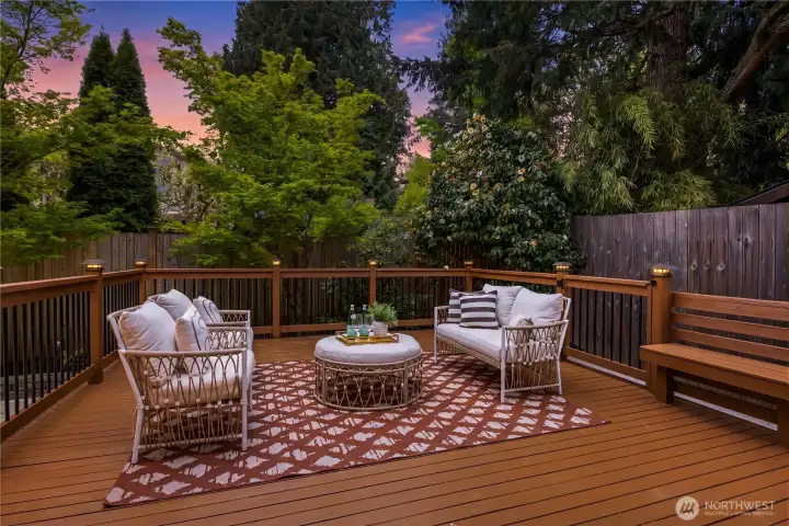 Another view of the deck...the lot is fully fenced and surrounded by mature plantings.