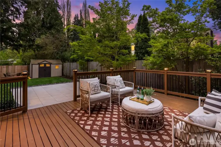 Looking this way from the deck, you can see the lower patio-it would be the perfect spot for a firepit and a few chairs or a fun place to ride a tricycle!