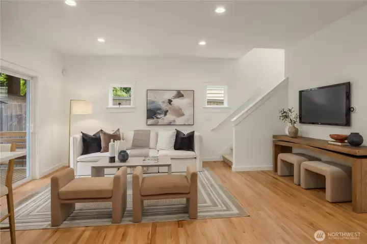 At the back of this photo yu can see the staircae leading to the second floor.