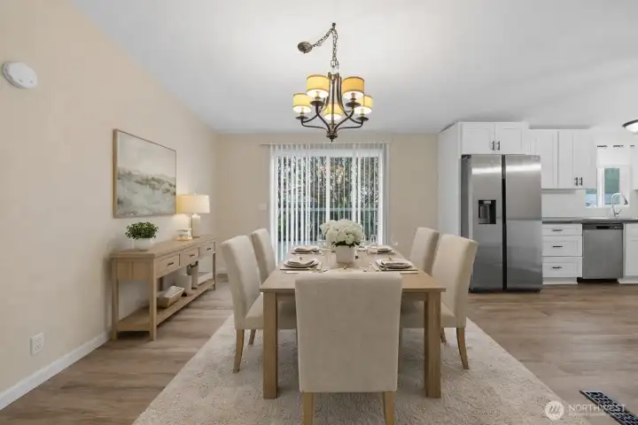 Dedicated dining area adjacent to kitchen. Virtually staged.