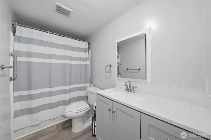 Full second bathroom with convenient layout.