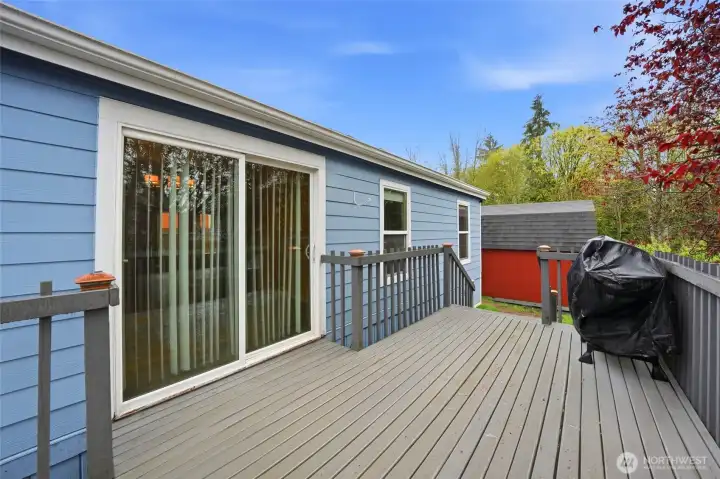 Private back deck for outdoor relaxation and entertaining.