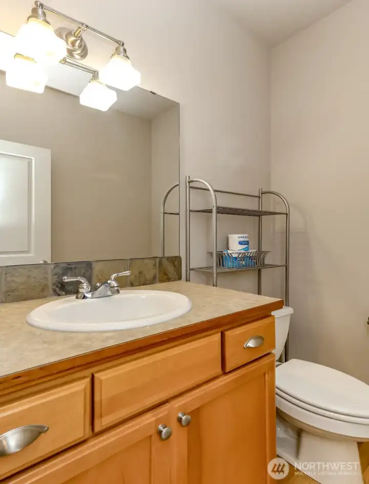Main floor guest bathroom. The entire home has been well maintained.