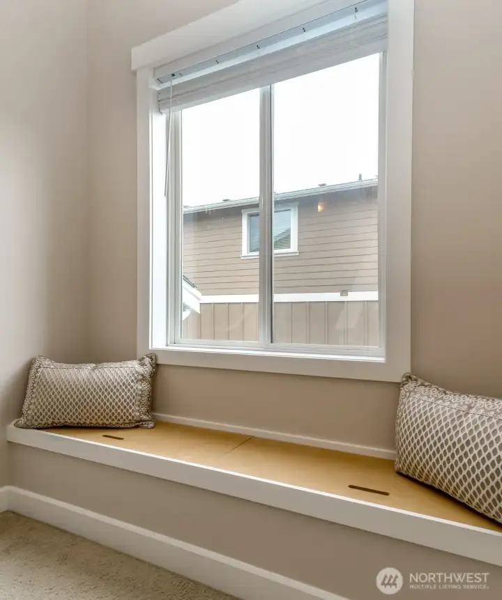 Love this bench with storage on the landing between floors. The one thing you need and just didn't know it!