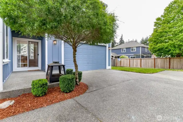 Sliding glass door off of kitchen to covered porch and patio.