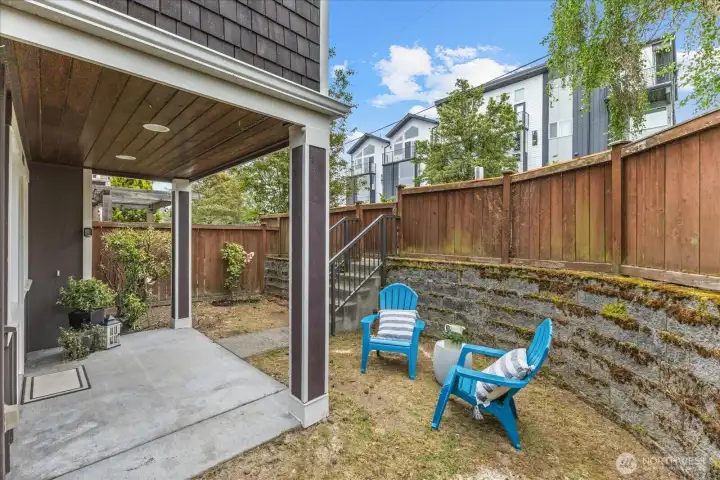 Covered entry patio plus an L-shaped fenced in area - make this your outdoor oasis! Covered entry patio plus an L-shaped fenced in area - make this your outdoor oasis!