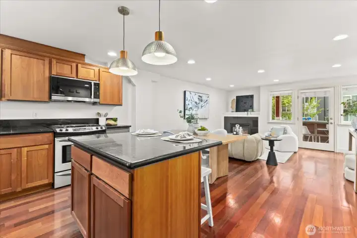 An open kitchen with island seating is perfect for entertaining An open kitchen with island seating is perfect for entertaining