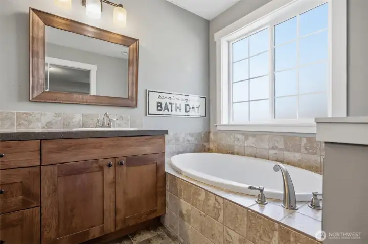 Soaking tub in the primary ensuite.