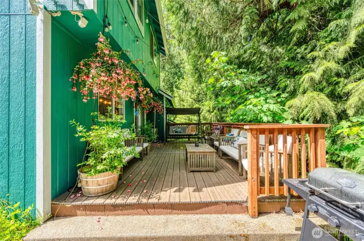 The trex deck is large with multiple sitting areas. The trex deck is large with multiple sitting areas.