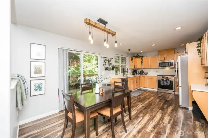 Large dining area off the kitchen has ample space for eating or gathering while still being connected to the living room. Large dining area off the kitchen has ample space for eating or gathering while still being connected to the living room.