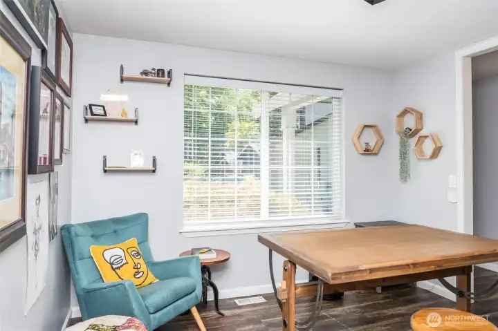 Traditionally this space is the formal separate dining room, the owner has utilized it as her tranquil art room and library, complete with a sliding ladder. Traditionally this space is the formal separate dining room, the owner has utilized it as her tranquil art room and library, complete with a sliding ladder.