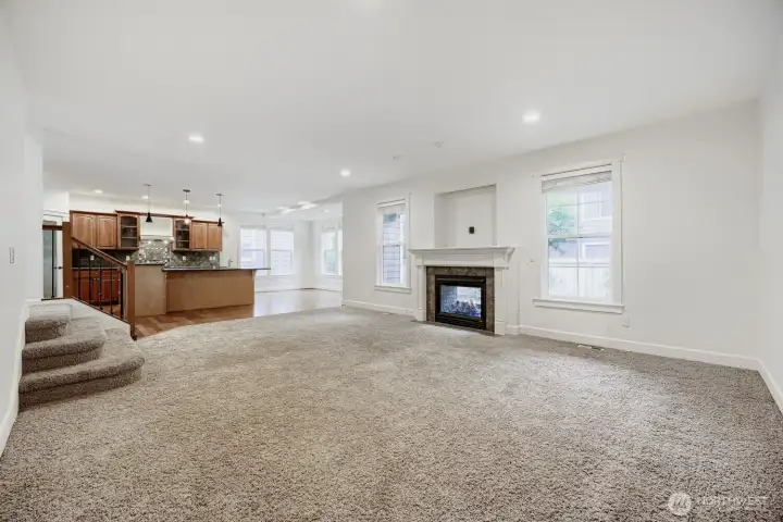 Cozy nights and special occasions alike feel right at home here. A stunning see-through fireplace connects the family room to the covered outdoor patio.