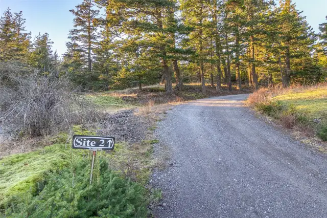 Property is located on the left and extends up near the end of the road.