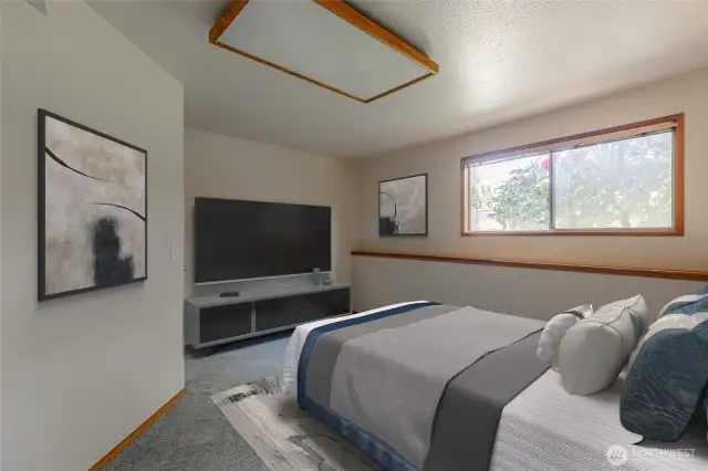 Lower level bedroom ideal for guests, an office, or creative space. Virtually staged.