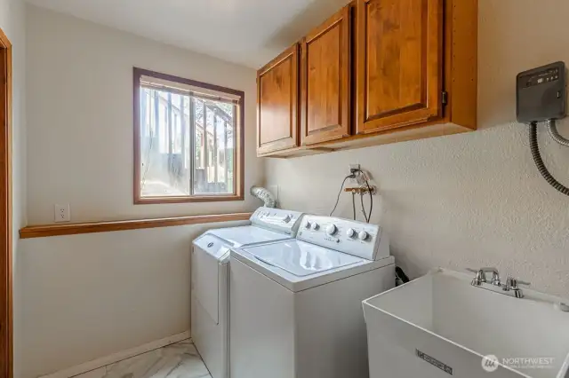 Utility room with convenient sink.