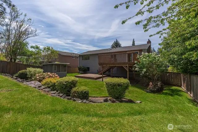 Large, fully fenced backyard.