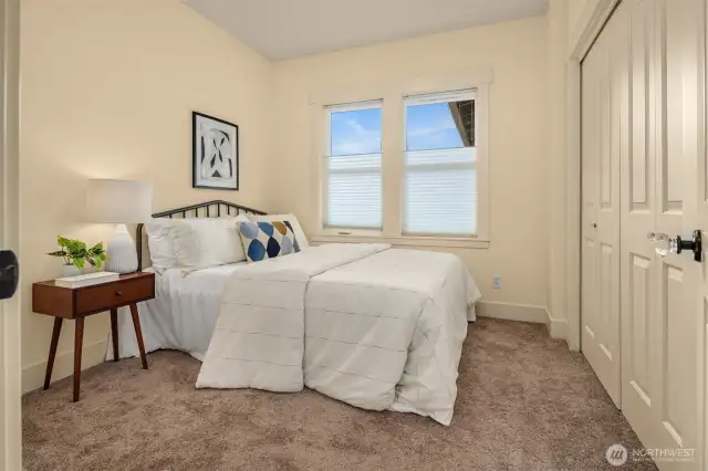 The second bedroom presents a versatile space with endless possibilities - guest room, home office, or creative area.