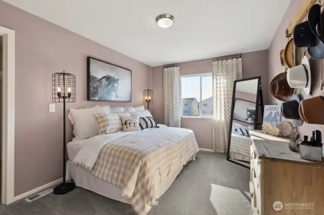 Bedroom #2 w/small WIC-Disclaimer- Photos are of another Lina floor plan from a previous community, photos are for illustrative purposes only. Finishes, flooring, upgrades, or other features may vary.