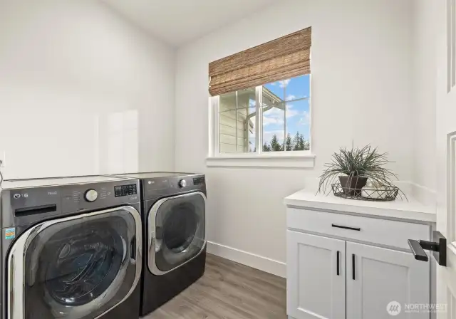 Utility room located just off the primary
