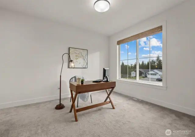 Den with a view of the from yard