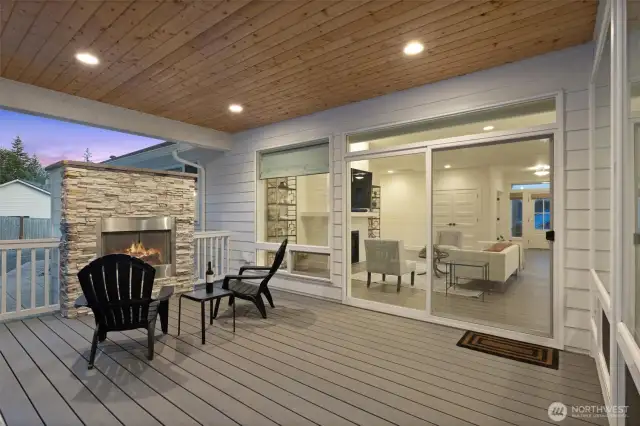 Covered deck with outdoor fireplace