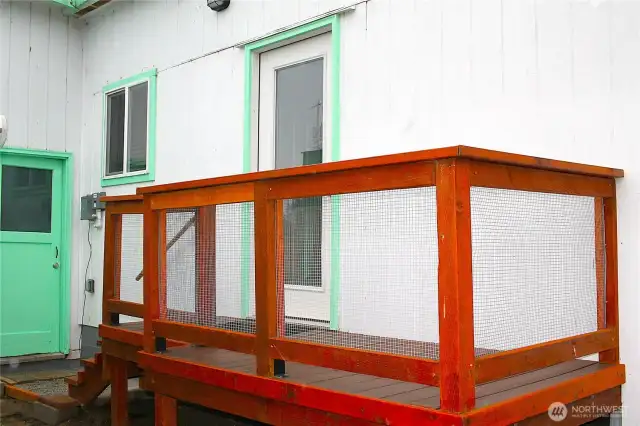 --- leads out to the back yard and entrance deck --