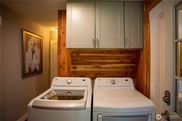 Cabinets above washer and dryer for convenience