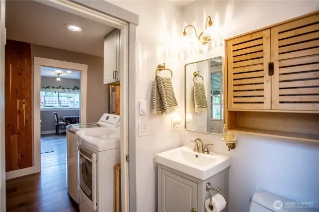 Laundry room is just off the kitchen and bathroom