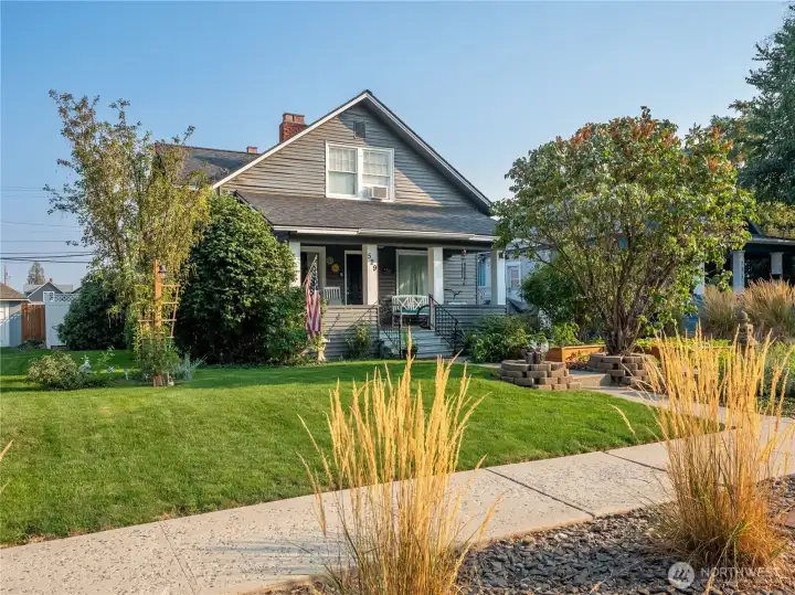 Classic 1922 Tudor with timeless architecture, updated exterior, and inviting curb appeal.