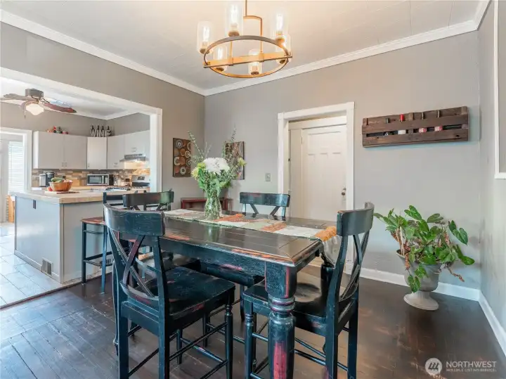 Dining area with original charm, steps away from the updated kitchen.
