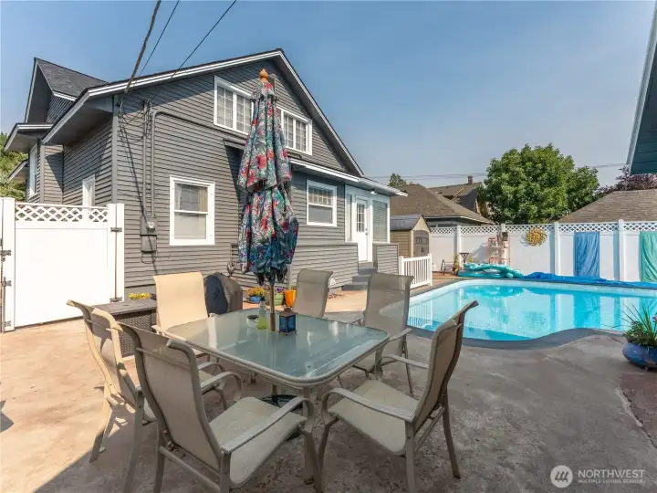Beautiful pool area with ample space for lounging, dining, and outdoor enjoyment.