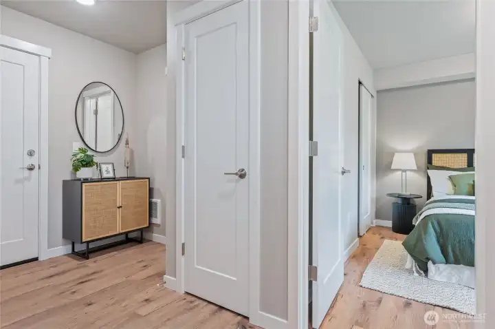 Entry level bedroom and garage access. Photos are of model home in the community.