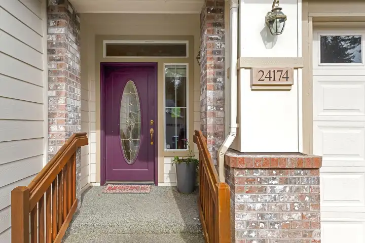 Formal Entry with 2-car garage to the right.