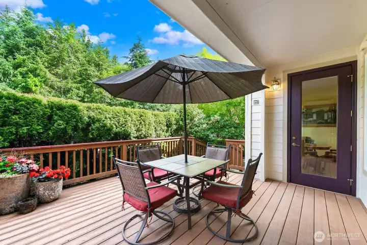 Large Deck with access from the Kitchen nook and the primary bedroom.