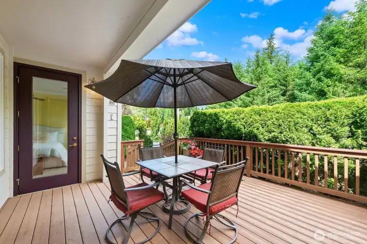 Large Deck with ramp down to 2 different Patios.