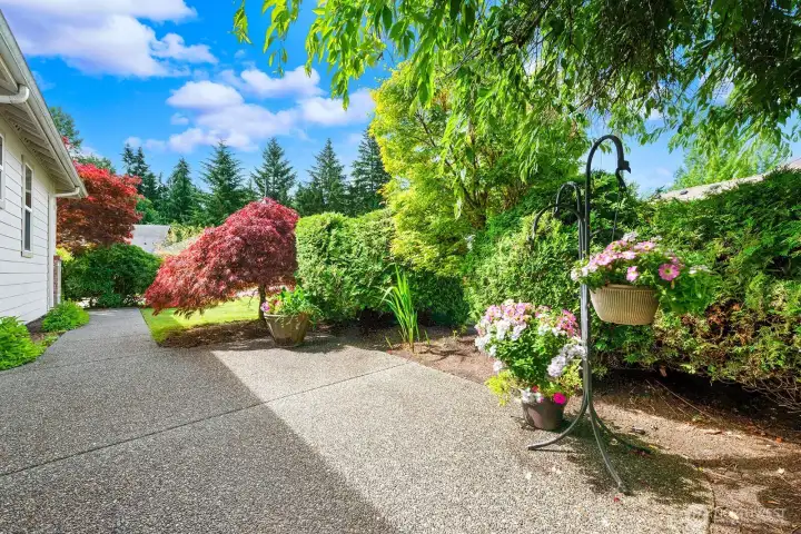 Spacious bonus Patio on the side of the house features bright West Exposure.