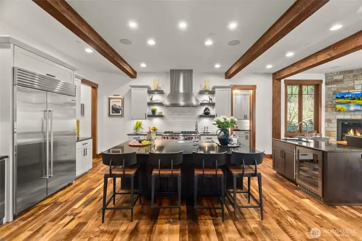 A true Chef's kitchen featuring double islands, each with its own sink, offering plenty of island seating for guests to gather and enjoy while you entertain. A true Chef's kitchen featuring double islands, each with its own sink, offering plenty of island seating for guests to gather and enjoy while you entertain.
