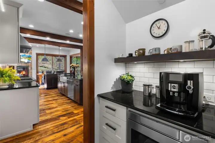 The charming coffee alcove with a built-in microwave is the perfect spot to ease into your morning. The charming coffee alcove with a built-in microwave is the perfect spot to ease into your morning.