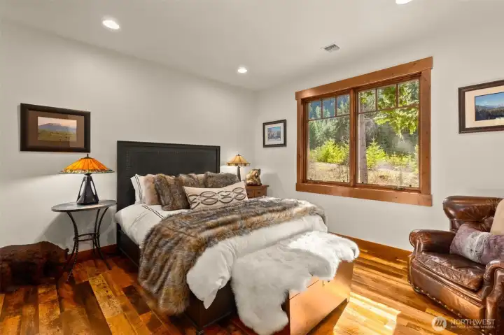 Bright and spacious, the second floor bedroom three accommodates a queen bed with two nightstands and a sitting area, complete with a large closet. Bright and spacious, the second floor bedroom three accommodates a queen bed with two nightstands and a sitting area, complete with a large closet.