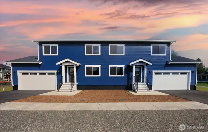 2-unit condo building. The gravel area is extra shared parking