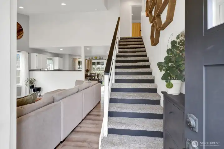 Step inside to soaring ceilings and sleek, modern updates throughout.