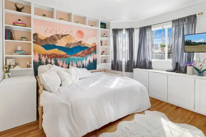 Bed # 2 faces south and features hardwood floors.